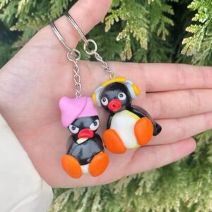 pareja_pinguinos_arcilla